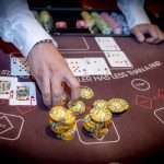Holland Casino Ultimate Texas Hold'em uitbetaling flush KJ harten hearts €100 veel chips