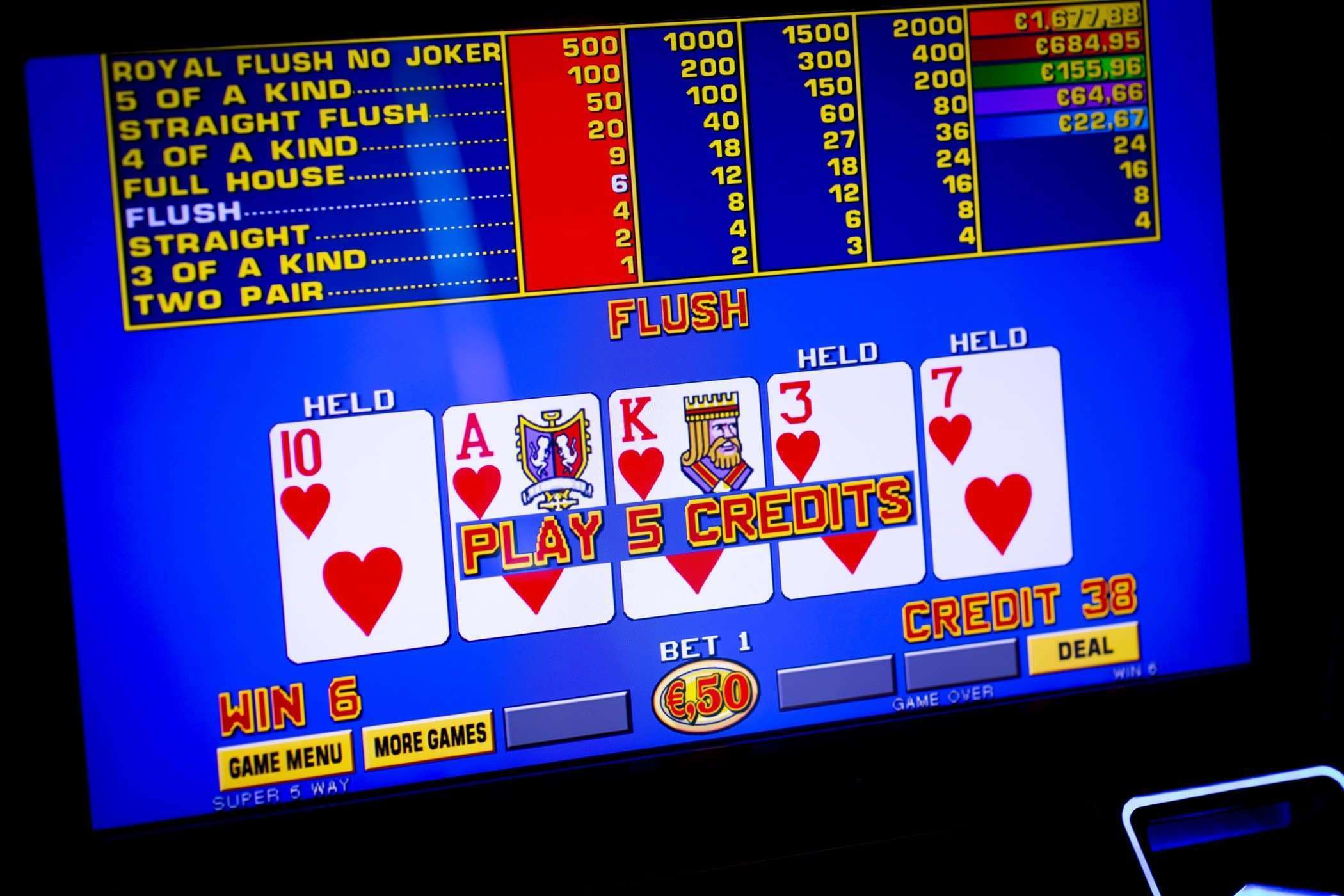 Holland Casino videopoker video poker speelautomaat speelautomaten gokkasten slot slots held hold bet credit vasthouden flush