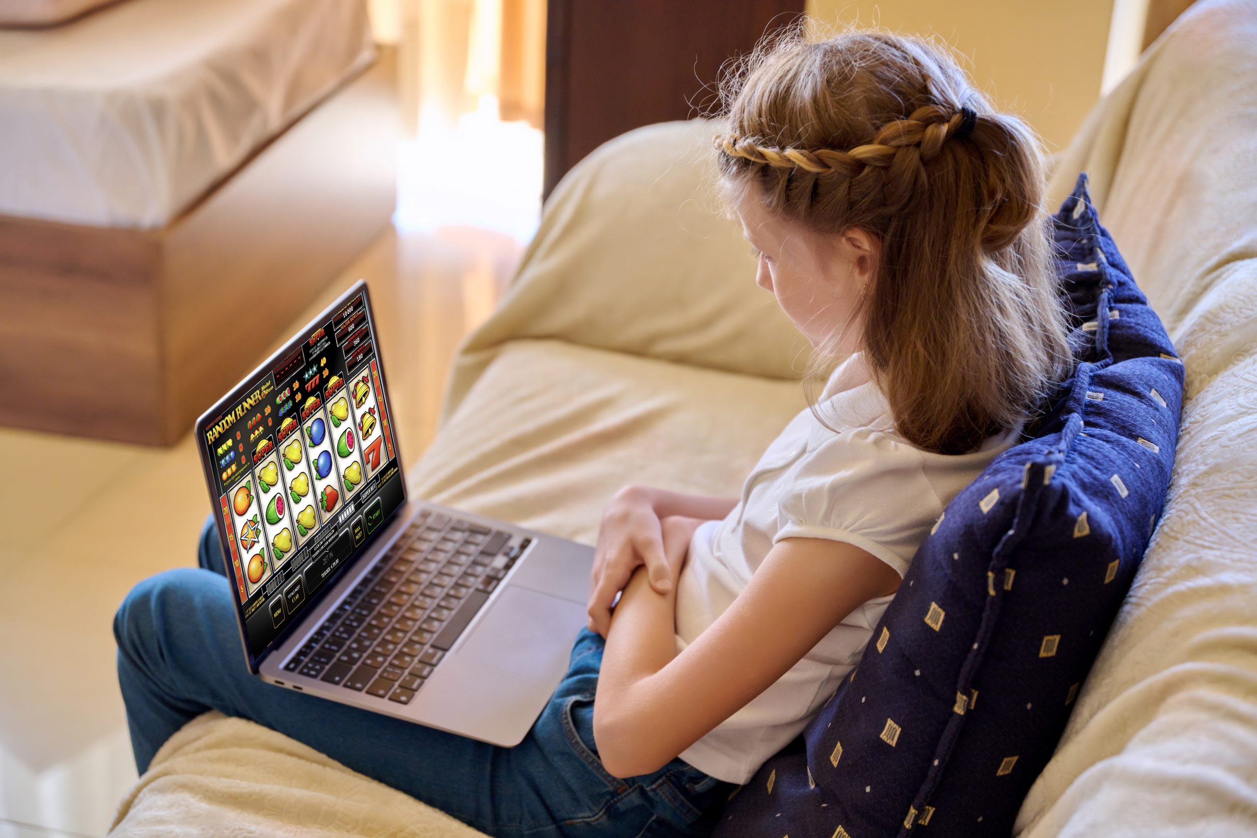 Kind laptop gokken school