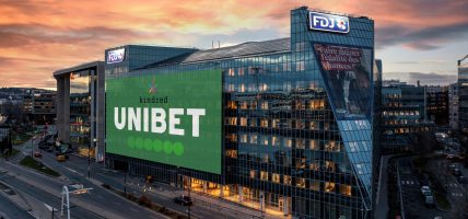 FDJ Kindred Unibet (mock-up door CasinoNieuws.nl, achtergrond via FDJ op https://www.groupefdj.com/mediatheque/)