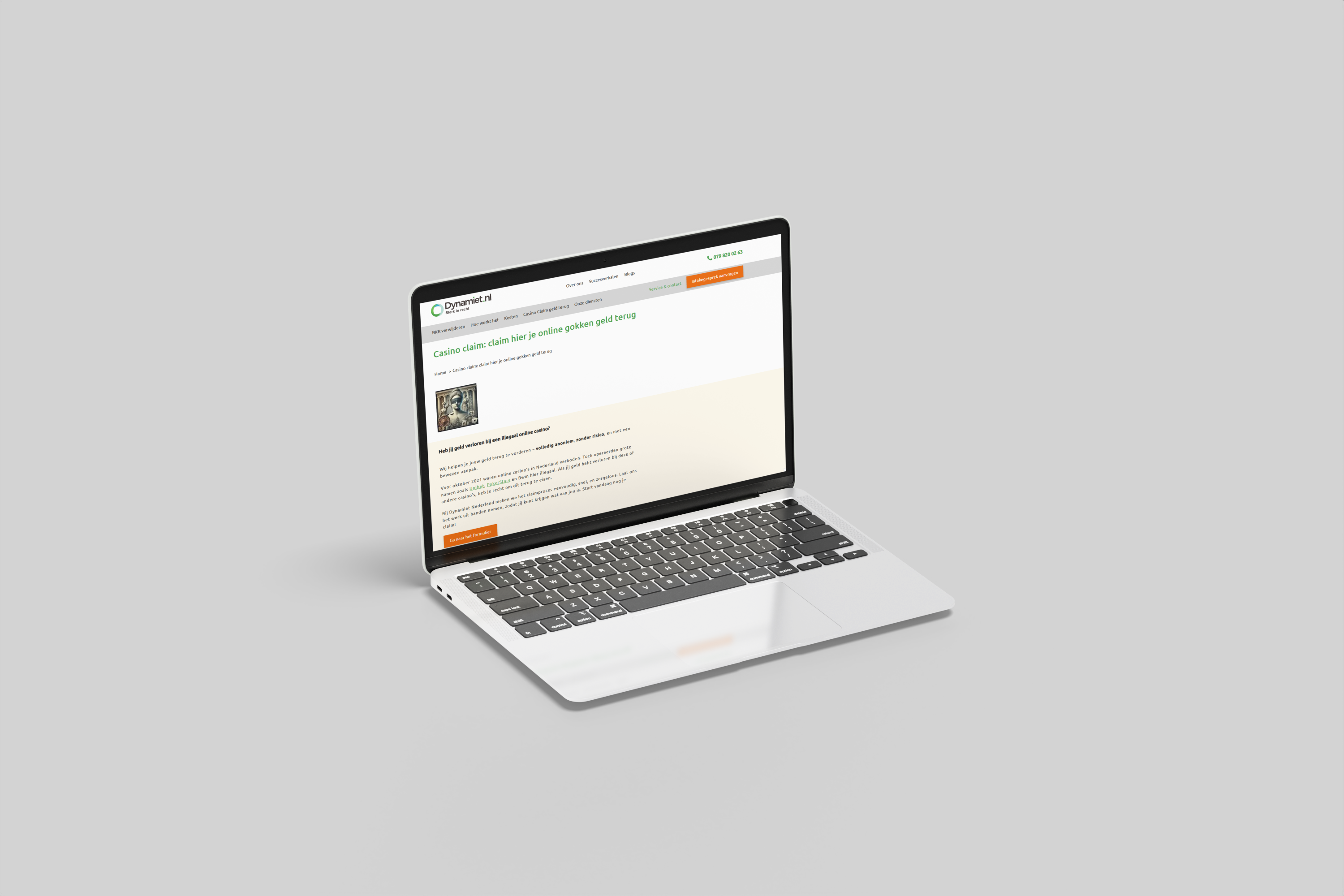 Laptop met de website van Dynamiet Nederland
